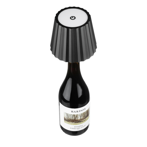 HJA47-NEGRO| Lámpara de mesa LED con batería incorporada | Una lámpara de mesa montada sobre una botella.